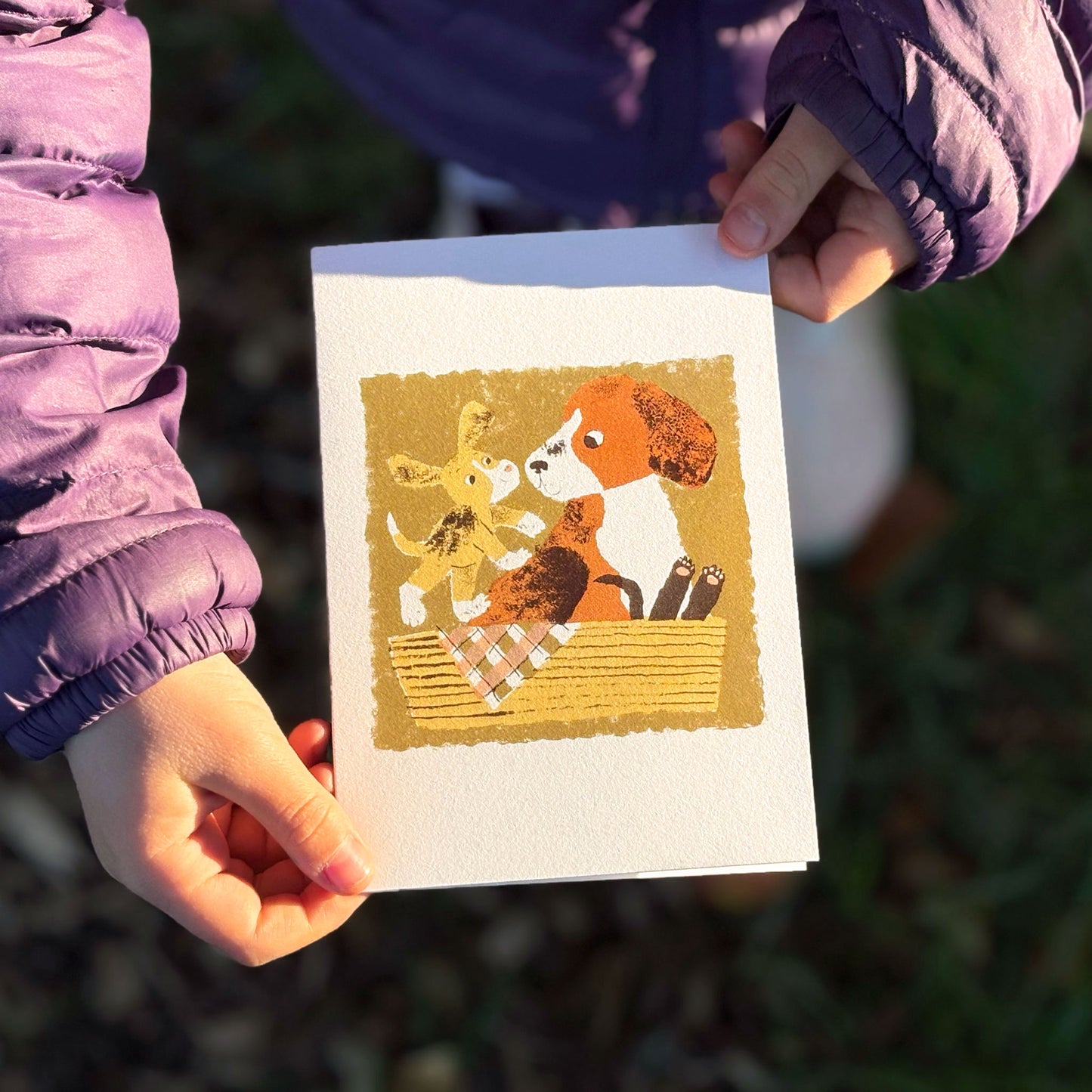 Dog and Puppies kids greetings card by Meg Rennie