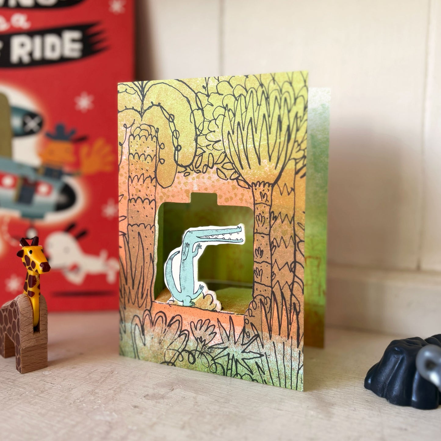 Crocodile Rock 3D die-cut kids jungle greetings card by Toby Rampton